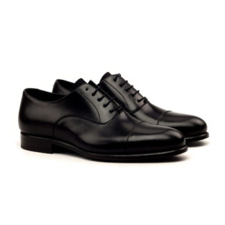 The Durham: Graphite. Black box calf oxfords against white background